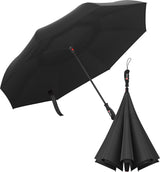 The Reverse Repel Umbrella is pictured. In the background, the reverse windproof umbrella is opened. In the foreground, the umbrella is in it's closed state showing off its technology. Both umbrellas are black.