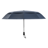 An image of the profile view of a navy blue colored, open travel Repel umbrella.